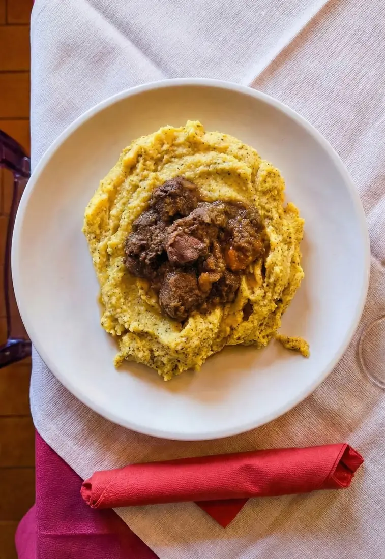 Cinghiale con Polenta Taragna